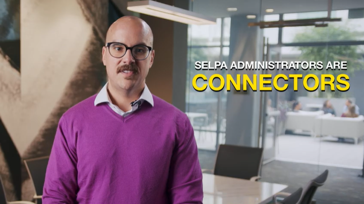 Thumbnail of a SELPA Administrator speaking in a conference room with text, "SELPA Administrators are Connectors"